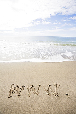 USA, Massachusetts, WWW drawn on sandy beach