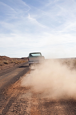 USA, Arizona, Winslow, Pick-up truck driving