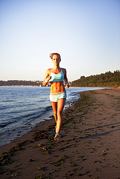 Woman running on the beach