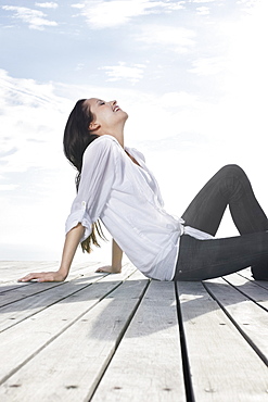 Woman relaxing on porch