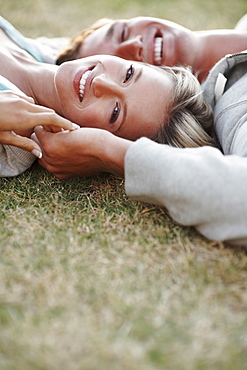 Couple relaxing on the grass