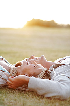 Couple relaxing on the grass