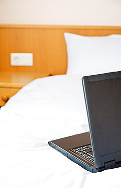 Laptop on bed