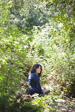 Young female in forest