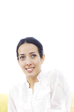 A woman outdoors smiling