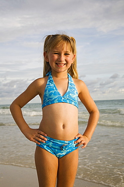 Girl wearing bikini at beach, Florida, United States