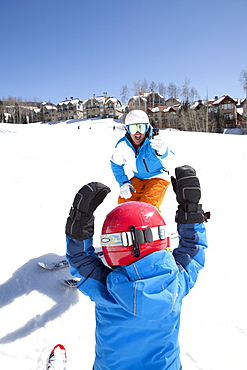 USA, Colorado, Telluride, Father skiing with son (2-3)