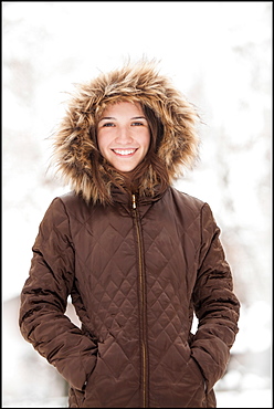 USA, Utah, Lehi, Portrait of young woman wearing winter coat outdoors