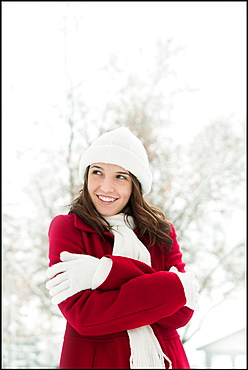 USA, Utah, Lehi, Young woman shivering in snow