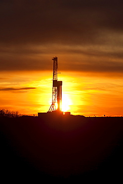 Silhouette of a drill rig