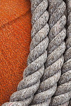 Close up of rope on rusted buoy, Bandon, OR