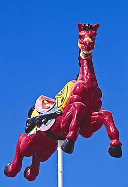 Mexico, Carousel painted horse used as building decor