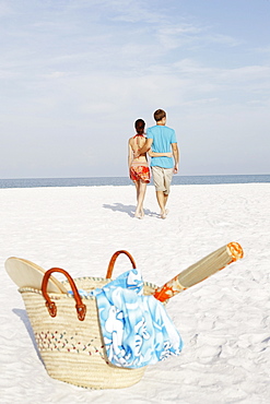 Couple walking on beach