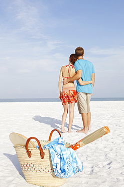 Couple hugging on beach