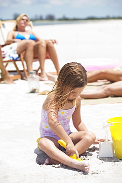 Family vacationing at beach