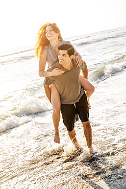 Couple on beach, Palm Beach, Florida