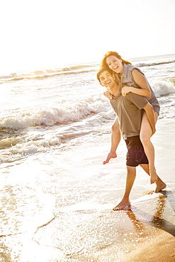 Couple on beach, Palm Beach, Florida