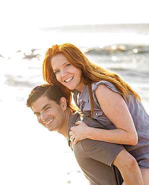 Portrait of couple on beach, Palm Beach, Florida