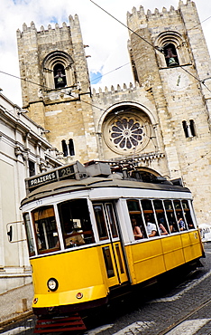 Tram in front of Lisbon Cathedral, Lisbon, Portugal