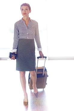 Senior business woman in airport