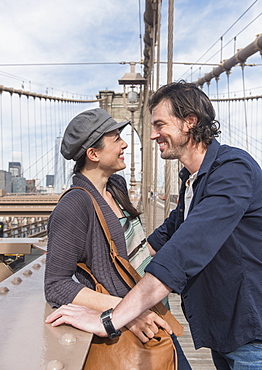 Happy couple on Brooklyn Bridge, Brooklyn, New York