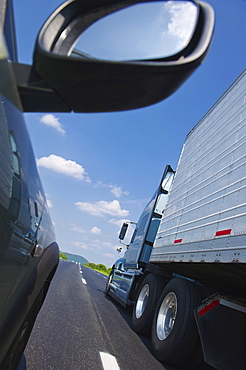 Truck and car on highway