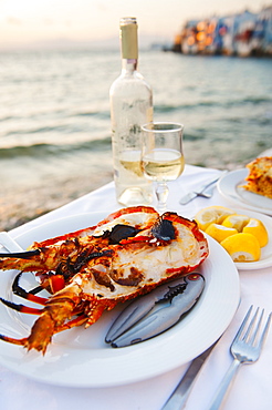 Greece, Cyclades Islands, Mykonos, Lobster dinner at coast