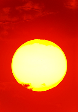 Close-up of large red sun