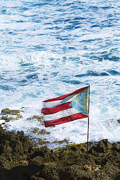 Puerto Rico, Old San Juan, flag of Puerto rice on sea coast