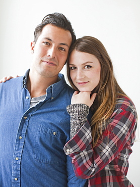 Studio Shot portrait of young couple