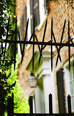 USA, South Carolina, Charleston, Close up of iron spikes on fence