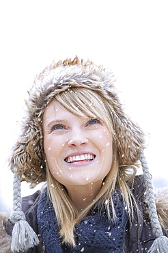 Portrait of woman wearing knit hat smiling