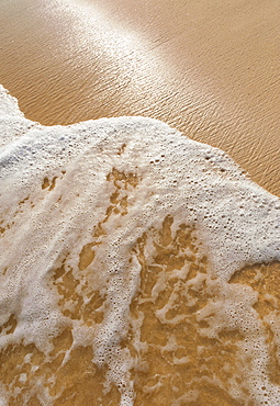 Sea waves on beach sand