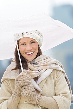 Portrait of woman with umbrella