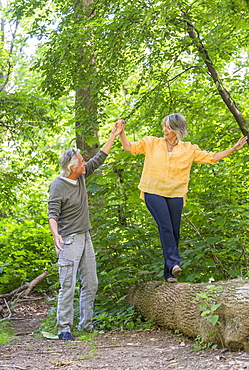 Senior couple hiking in forest, Central Park, New York City