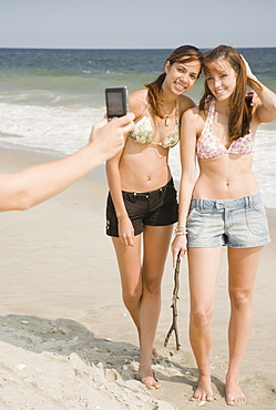 Young women having photograph taken