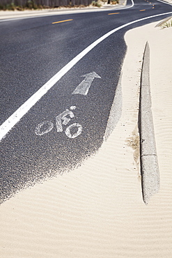 Oregon, Florence, Bike lane partially covered in snow, Florence, Oregon