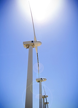 USA, California, Palm Springs, Coachella Valley, San Gorgonio Pass, Wind turbines against blue sky