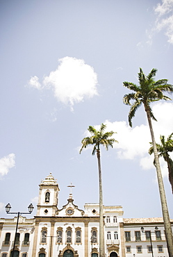 Brazil, Bahia, Salvador De Bahia, Facade of old church with palm trees in front