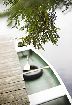 USA, New York, Putnam Valley, Roaring Brook Lake, Boat moored at pier