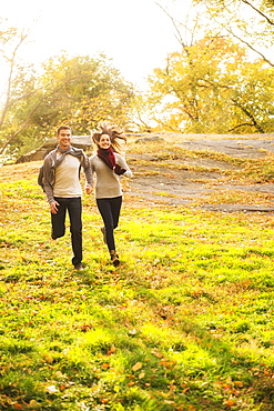 Couple running in Central Park, USA, New York State, New York City