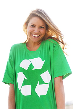 Front view of woman wearing green t-shirt