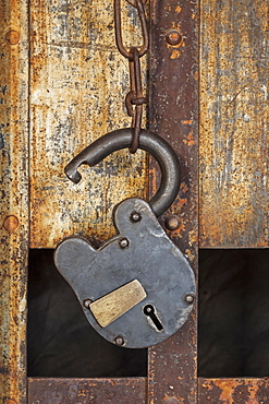 Antique prison cell close-up on padlock