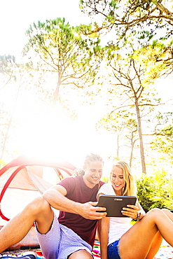 Couple looking at digital tablet, Tequesta, Florida