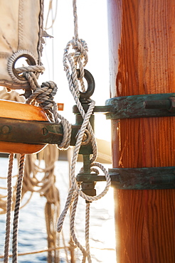 Close-up view of yacht ropes, boom and main mast