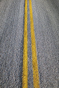 Close-up of double yellow line on road