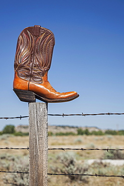 Rozet, Leather cowboy boot on post, Rozet, Wyoming