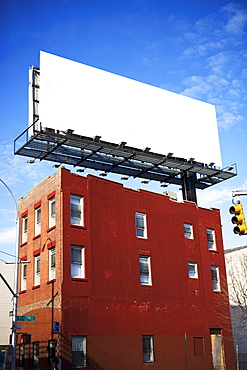 Blank billboard on urban building