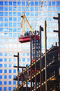 Urban construction site with crane