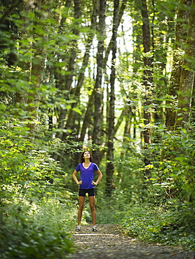 Young women resting in forest, USA, Oregon, Portland